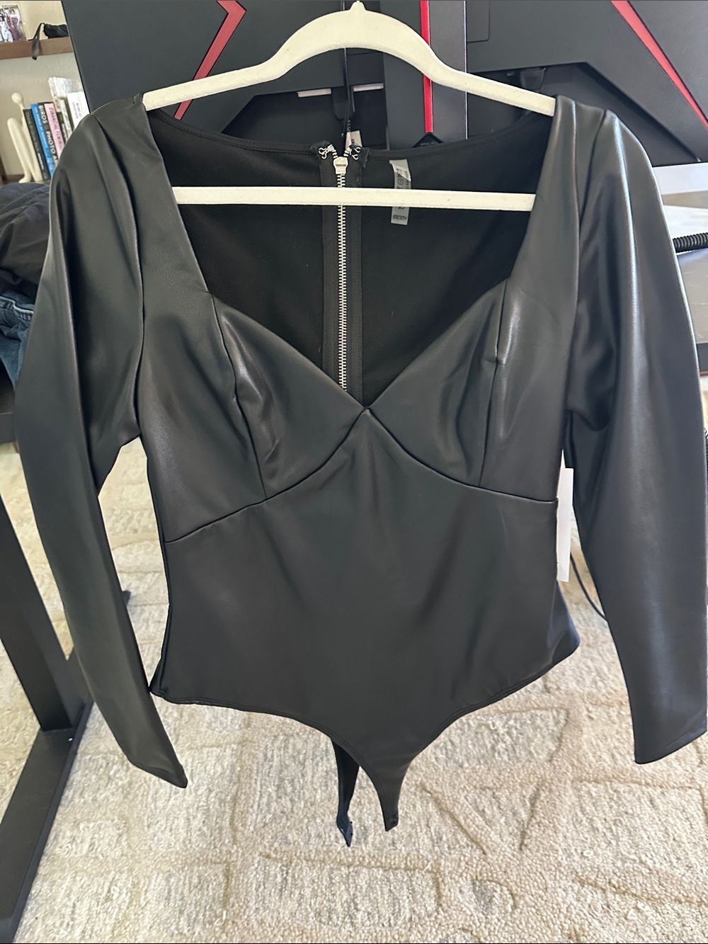 AKIRA Black Faux Leather Long-Sleeve Bodysuit